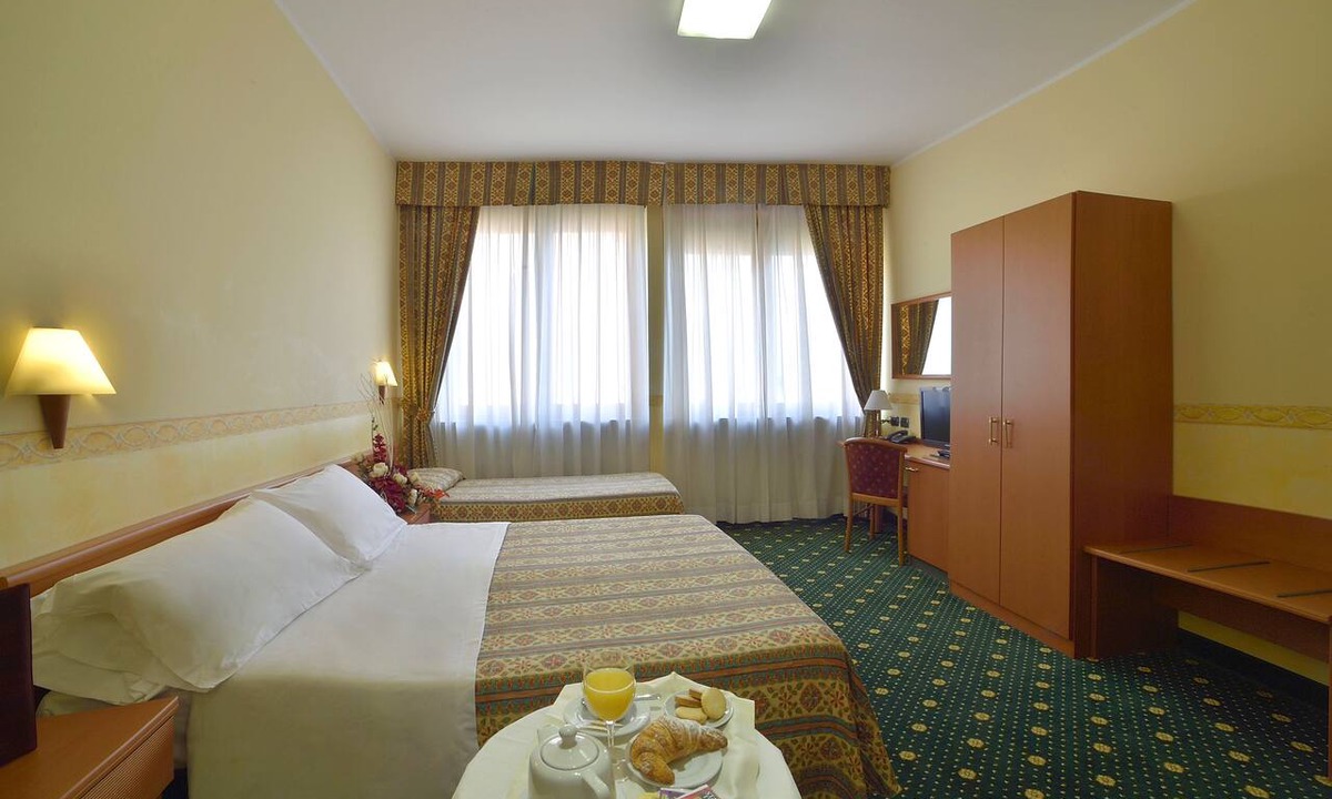 Druento Hotel | Dropiluc