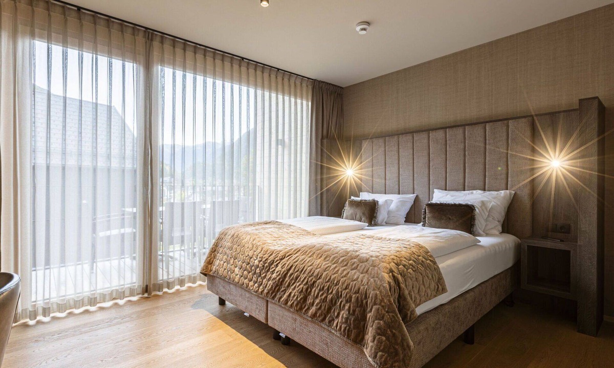Schruns Apartment | Nice apartment for 10 guests with WIFI, pool, TV, balcony and parking