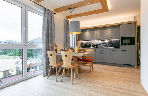Haus im Ennstal Apartment | Apartment with a private sauna and a balcony