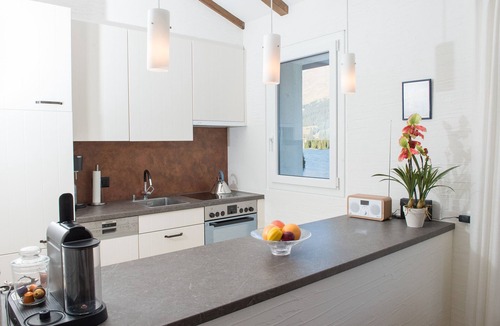 Lenzerheide Apartment | Attic apartment with pool, sauna, and fireplace