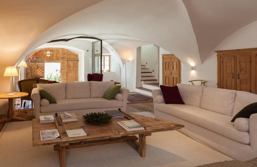 La Punt-Chamues-ch Apartment | Ches'Ota: Historic Engadine House with Garden and Modern Flair