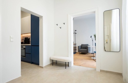 Funfhaus Apartment | Contemporary apartment with a balcony.