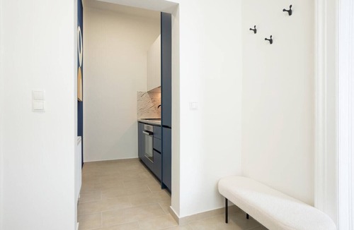 Funfhaus Apartment | Contemporary apartment with a balcony.