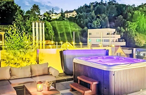 Graz-Straßgang Apartment | Cosy apartment for 6 guests with A/C, WIFI, hot tub, TV, terrace and pets allowed