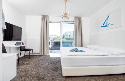 Velden am Worther See Hotel | Hotel Velden - 24 Checkin Zimmer im Zentrum