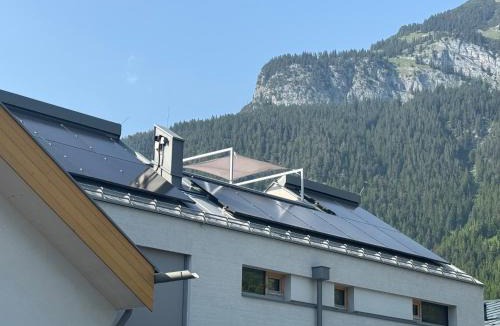 Maurach House | Modern Alpine Penthouse with Lake View
