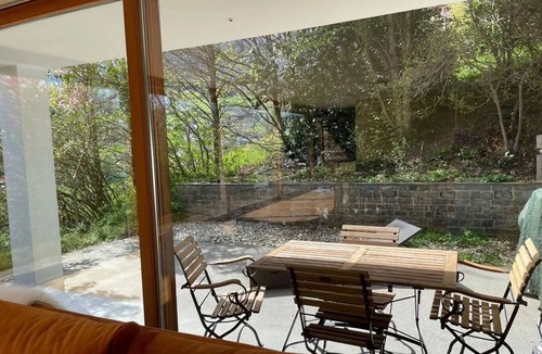 Toster Villa | Villa Noomi - Elegant design villa with mountain views, garden & fireplace in Frastanz