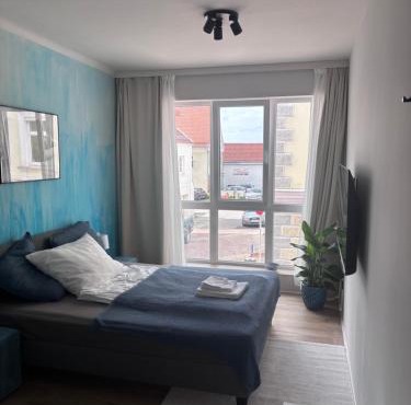 Design Zimmer mit eigenem Bad und WC im Herzen von Haag