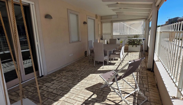 Elegantly renovated beachfront apartment with a courtyard and parking space in Fermo