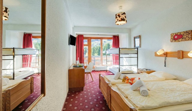 Hotel Relais Alpin Family Room & Balcony8 226, Les Mosses, Switzerland in Les Mosses