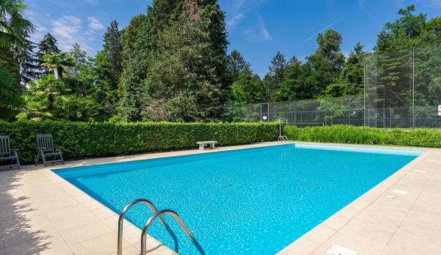 Nice apartment for 4 guests with A/C, pool, WIFI, TV and terrace in Germignaga