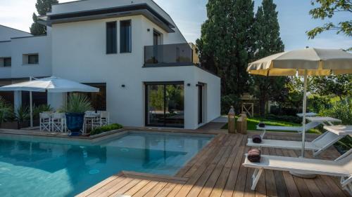 ONDA 8, Emma Villas in Santa Maria di Scacciano
