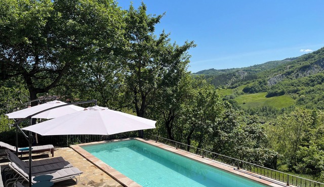 Stunning Renovated 3 floors Stone farmhouse with pool overlooking the Dolo river in Emilia-Romagna
