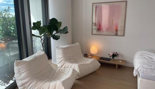One-Bedroom Apartment with Balcony and City View