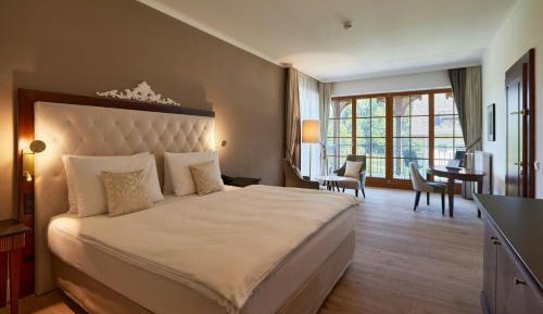 Junior King Suite with Garden View and Balcony