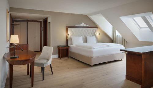 Superior King Suite with Sofa Bed and Garden View