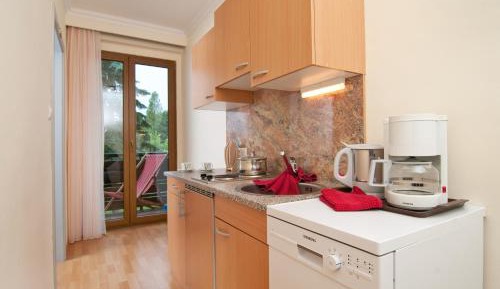 One-Bedroom Apartment with Balcony and Lake View