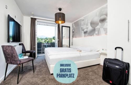Velden am Worther See Hotel | Hotel Velden - 24 Checkin Zimmer im Zentrum