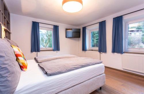 Lofer Apartment | Großes Ferienhaus für 10 Personen mit Kachelofen & Bergblick