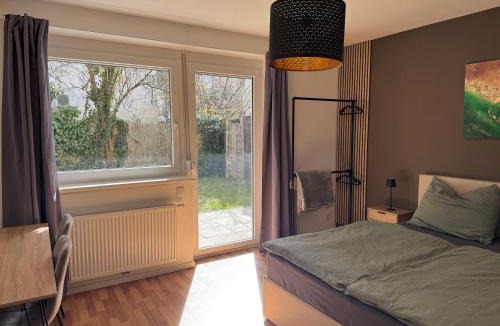 Lend Apartment | Städtische Ruheoase mit Garten & gratis Parkplatz