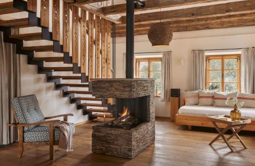 Deutschlandsberg Villa | Am Wildbachberg - Luxus Ferienhäuser mit Infinitypool, Privatsauna und Weinkeller
