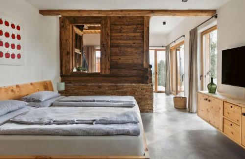 Deutschlandsberg Villa | Am Wildbachberg - Luxus Ferienhäuser mit Infinitypool, Privatsauna und Weinkeller
