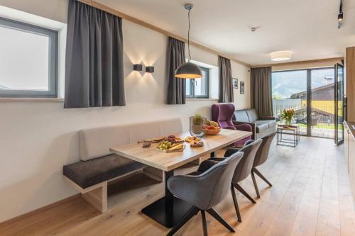 Emma Deluxe Aparthotel, Aircondition, ganzjährig beheizter Außenpool & Skibus direkt vor der Tür
